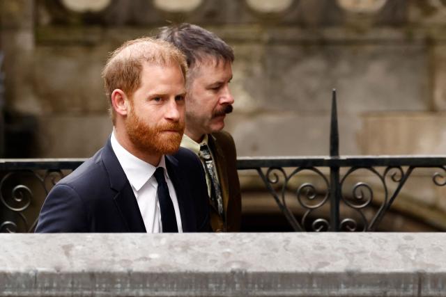 Britain's Prince Harry arrives outside the High Court in London on January 20, 2026, for the second day of trial in his case against a major UK newspaper group. Prince Harry, pop icon Elton John and his husband David Furnish and four other high-profile figures are suing Associated Newspapers Ltd (ANL), the publisher of the Daily Mail and The Mail on Sunday, for privacy invasions. (Photo by Brook Mitchell / AFP)