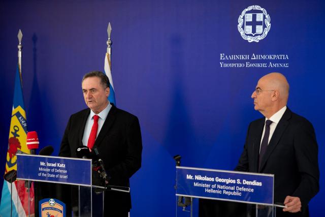 Greece's Defence Minister Nikos Dendias (R) and Israeli Defence Minister Israel Katz attend a joint press conferense in Athens on January 20, 2026. (Photo by Aggelos NAKKAS / AFP)