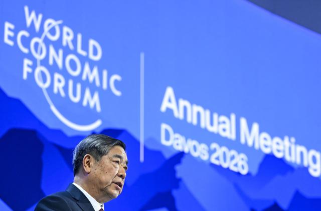 China's Vice-Premier He Lifeng delivers a speech during the World Economic Forum (WEF) annual meeting in Davos on January 20, 2026. The World Economic Forum takes place in Davos from January 19 to January 23, 2026. (Photo by Fabrice COFFRINI / AFP)