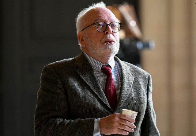 French far-right party Rassemblement National (RN) treasurer and accountant Wallerand de Saint-Just looks on in a break during the hearing in the appeal trial of Rassemblement National (RN) parliamentary assistants on suspicion of embezzlement of European public funds at Paris courthouse in Paris on January 20, 2026. Marine Le Pen is called to the stand in the appeal trial in Paris of the parliamentary assistants of the National Front, where she is playing for her candidacy for the 2027 presidential election. Twelve of the accused, as well as the far-right party itself, have appealed against the verdict while another 12 people -- including one of Le Pen's sisters -- have decided to accept their convictions without appealing. (Photo by Bertrand GUAY / AFP)