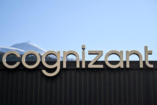This photograph taken on January 20, 2026 shows the logo of US multinational information technology consulting and outsourcing company Cognizant in the Alpine resort of Davos during the World Economic Forum (WEF) annual meeting. The World Economic Forum takes place in Davos from January 19 to January 23, 2026. (Photo by INA FASSBENDER / AFP)