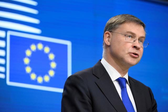 EU Commissioner for Economy and Productivity, Implementation and Simplification Valdis Dombrovskis gives a press conference during the Ecofin Economic and Financial Affairs Council, at the EU headquarters in Brussels, on January 20, 2026. (Photo by JOHN THYS / AFP)
