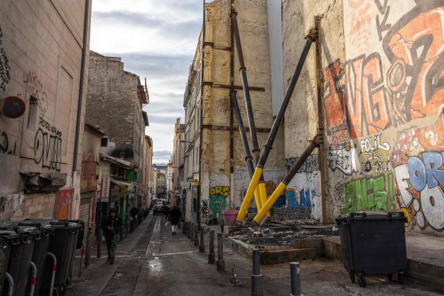 This photo shows buildings with facades in poor condition in downtown Marseille, southeastern France on January 20, 2026. (Photo by MIGUEL MEDINA / AFP)