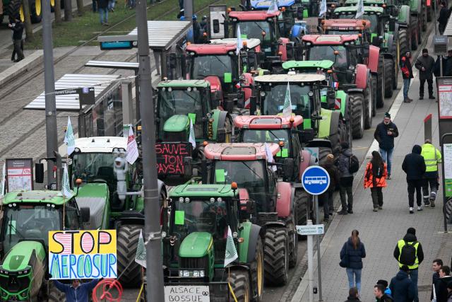 Farmers parked their tractors during a protest following the signing of the free trade agreement between the European Union and the Mercosur countries and on the eve of a vote on a referral to the courts, near the European Parliament in Strasbourg on January 20, 2026. Called by the FNSEA, France's leading national agricultural union, some 4,000 farmers from across the European Union, including Italy, Belgium, and Germany, are expected to attend the protest. MEPs will not vote on the entire agreement with Mercosur until the coming months, but they are set to vote on Wednesday on whether to refer the matter to the Court of Justice of the European Union (CJEU). (Photo by NICOLAS TUCAT / AFP)