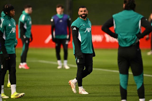 Liverpool's Egyptian striker #11 Mohamed Salah smiles as he attends a team training session at their training ground in Kirkby, Liverpool, north-west England on January 20, 2026, on the eve of their UEFA Champions League, league phase football match against Olympique Marseille in Marseille. (Photo by Oli SCARFF / AFP)