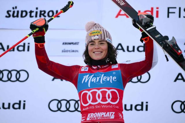 Austria's Julia Scheib, winner, celebrates on the podium of the Women's Giant Slalom event of FIS Alpine Skiing World Cup in Kronplatz, Plan de Corones, Italy, on January 20, 2026. (Photo by Marco BERTORELLO / AFP)