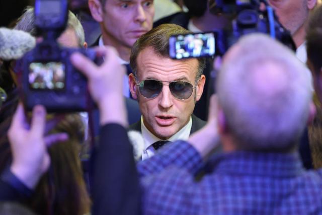 France's President Emmanuel Macron speaks to the press after delivering a speech during the World Economic Forum (WEF) annual meeting in Davos on January 20, 2026. The World Economic Forum takes place in Davos from January 19 to January 23, 2026. (Photo by Ludovic MARIN / AFP)