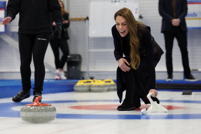 Britain's Catherine, Princess of Wales takes part in curling during a visit to meet with the Team GB and Paralympics GB Curling teams, ahead of the Winter Olympic Games, at the National Curling Academy in Stirling, in Scotland on January 20, 2026. (Photo by Russell Cheyne / POOL / AFP)