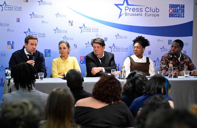 (From L) Belgian lawyers Christophe Marchand and Jehosheba Bennett, German lawyer of ECCHR  NGO Wolfgang Kaleck, and family members of murdered Congolese independence icon Patrice Lumumba Yema Lumumba and Mehdi Lumumba, hold a press conference following a hearing before a Belgian court to weigh prosecuting the sole surviving suspect over the 1961 killing, in Brussels, on January 19, 2026. Some 65 years after Lumumba was executed and his body dissolved in acid by separatists with the help of mercenaries from former colonial power Belgium, only one ex-official is still alive to face justice. That is 93-year-old Etienne Davignon, a one-time European commissioner, who was a novice Belgian diplomat at the time of Lumumba's killing. (Photo by JOHN THYS / AFP)