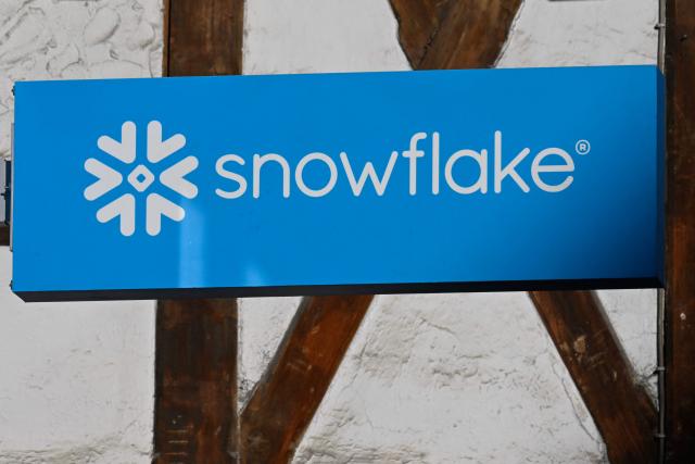 This photograph taken on January 20, 2026 shows signage bearing the Snowflake logo during the World Economic Forum (WEF) annual meeting in Davos. The World Economic Forum takes place in Davos from January 19 to January 23, 2026. (Photo by INA FASSBENDER / AFP)