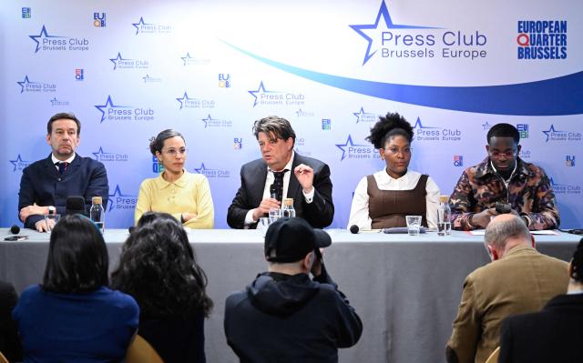 (From L) Belgian lawyers Christophe Marchand and Jehosheba Bennett, German lawyer of ECCHR  NGO Wolfgang Kaleck, and family members of murdered Congolese independence icon Patrice Lumumba Yema Lumumba and Mehdi Lumumba, hold a press conference following a hearing before a Belgian court to weigh prosecuting the sole surviving suspect over the 1961 killing, in Brussels, on January 19, 2026. Some 65 years after Lumumba was executed and his body dissolved in acid by separatists with the help of mercenaries from former colonial power Belgium, only one ex-official is still alive to face justice. That is 93-year-old Etienne Davignon, a one-time European commissioner, who was a novice Belgian diplomat at the time of Lumumba's killing. (Photo by JOHN THYS / AFP)