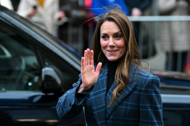Britain's Catherine, Princess of Wales waves to well wishers following a visit to Radical Weavers, a working handweaving studio and independent charity, during a visit to Stirling, Scotland on January 20, 2026. (Photo by ANDY BUCHANAN / AFP)