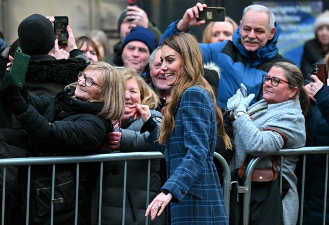 Britain's Catherine, Princess of Wales poses for a photo with well wishers following a visit to Radical Weavers, a working handweaving studio and independent charity, during a visit to Stirling, Scotland on January 20, 2026. (Photo by ANDY BUCHANAN / AFP)