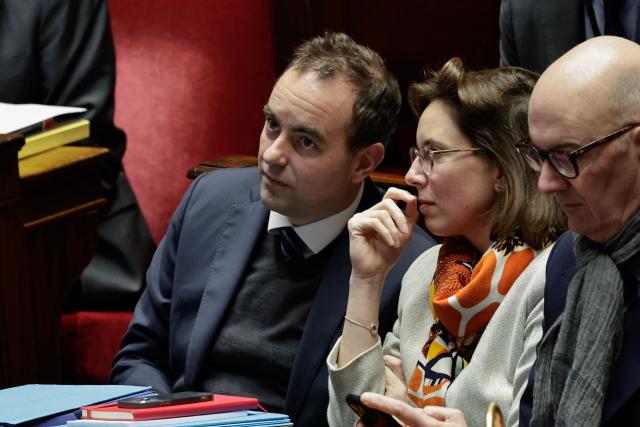 LtoR, France's Prime Minister Sebastien Lecornu, France's Public Accounts Minister Amelie de Montchalin and France's Economy and Finance Minister Roland Lescure attend the examination of the budget bill for 2026 at the Assemblee Nationale, France's Parliament lower house, in Paris on January 20, 2026. (Photo by STEPHANE DE SAKUTIN / AFP)