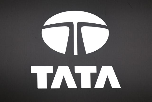 Signage shows the Tata logo during the World Economic Forum (WEF) annual meeting in Davos on January 20, 2026. The World Economic Forum takes place in Davos from January 19 to January 23, 2026. (Photo by INA FASSBENDER / AFP)
