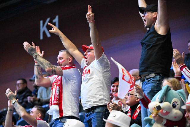 Poland supporters cheer during the EHF Euro 2026 Group F preliminary round handball match between Poland and Italy in Kristianstad, Sweden, on January 20, 2026. (Photo by Johan Nilsson/TT / TT News Agency / AFP) / Sweden OUT