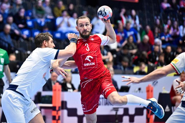 Poland's right winger #03 Michal Daszek plays the ball during the EHF Euro 2026 Group F preliminary round handball match between Poland and Italy in Kristianstad, Sweden, on January 20, 2026. (Photo by Johan Nilsson/TT / TT News Agency / AFP) / Sweden OUT