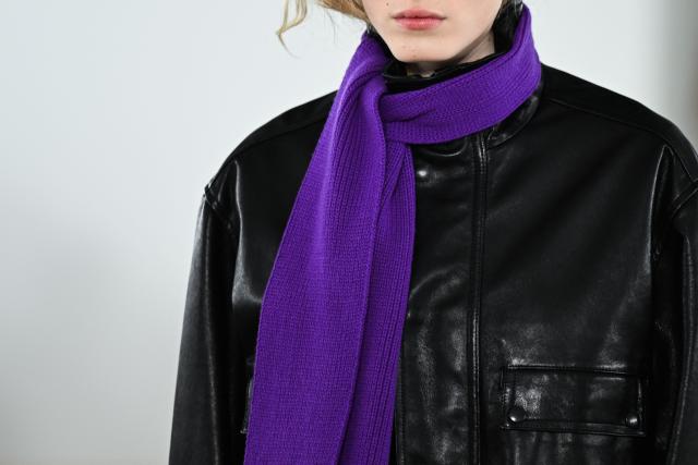 A model presents a scarf by the Auralee Menswear Ready-to-wear Fall-Winter 2026/2027 collection as part of the Paris Fashion Week in Paris on January 20, 2026. (Photo by Blanca CRUZ / AFP)