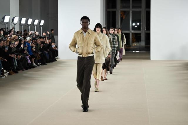 Models present creations for the Auralee Menswear Ready-to-wear Fall-Winter 2026/2027 collection as part of the Paris Fashion Week in Paris on January 20, 2026. (Photo by Blanca CRUZ / AFP)