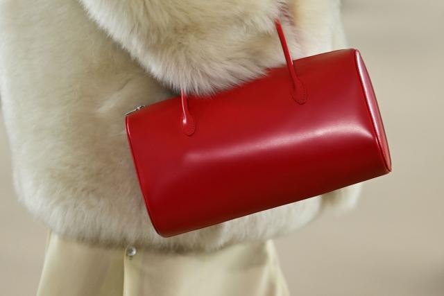 A model presents a bag by Auralee Menswear Ready-to-wear Fall-Winter 2026/2027 collection as part of the Paris Fashion Week in Paris on January 20, 2026. (Photo by Blanca CRUZ / AFP)