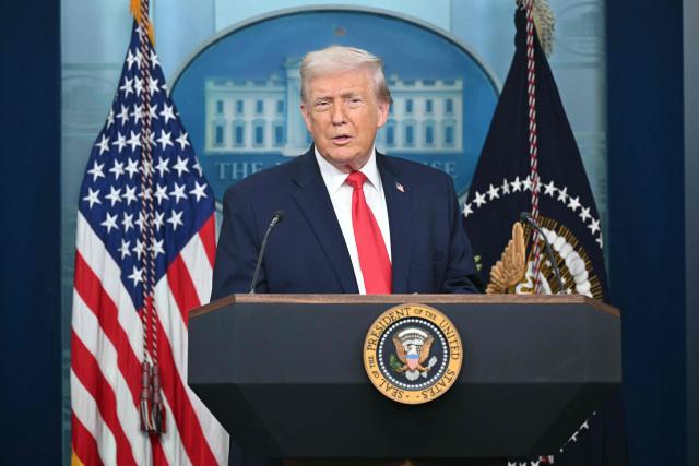 US President Donald Trump speaks during a briefing in the Brady Briefing Room of the White House in Washington, DC, on January 20, 2026. The White House said President Donald Trump will hold a press conference Tuesday exactly a year into his second term, amid acute international tension over his drive to take over Greenland. (Photo by SAUL LOEB / AFP)