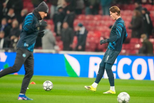 Napoli's Scottish midfielder #08 Scott McTominay warms up before the UEFA Champions League, league Phase - day 7 football match between FC Copenhaben and SSC Napoli in Copenhagen, Denmark, on January 20, 2026. (Photo by Liselotte Sabroe / Ritzau Scanpix / AFP) / Denmark OUT