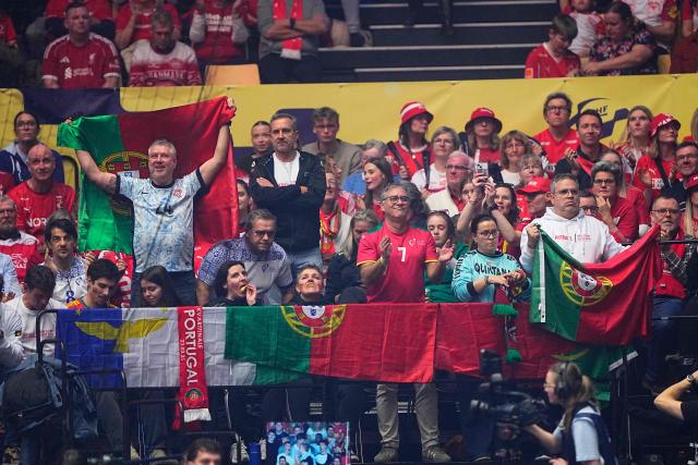 Portugal fans cheer prior to the EHF Euro 2026 Group B preliminary round handball match between Denmark and Portugal in Herning, Denmark, on January 20, 2026. (Photo by Bo Amstrup / Ritzau Scanpix / AFP) / Denmark OUT