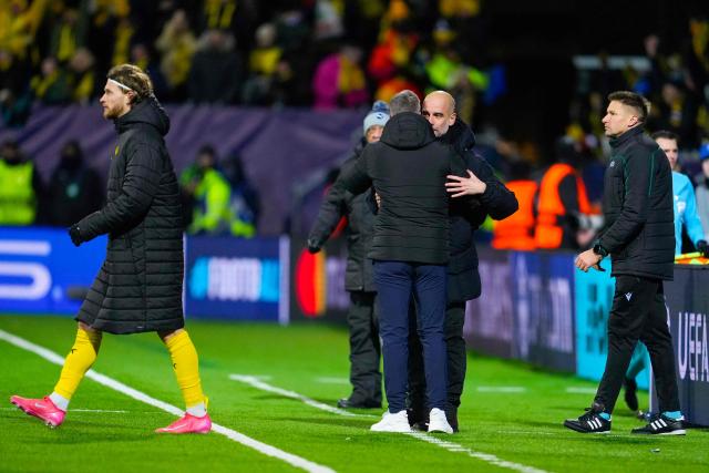 vie for the ball during the UEFA Champions League, league Phase - day 7 football match between Bodoe/Glimt and Manchester City in Bodoe, Norway on January 20, 2026. (Photo by Fredrik Varfjell / NTB / AFP) / Norway OUT