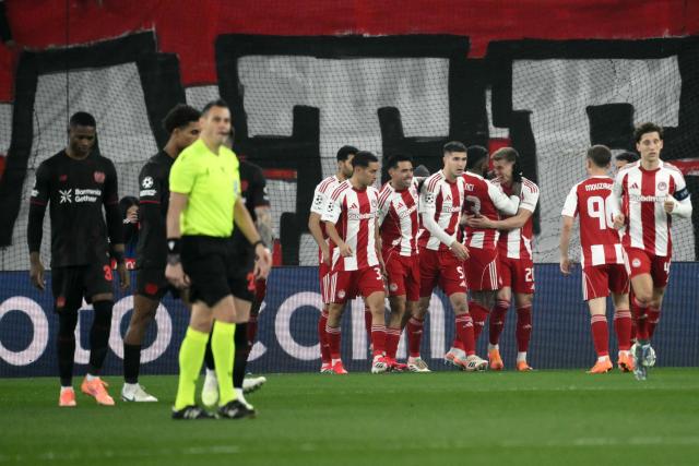 Olympiakos' Portuguese defender #20 Costinha (3rd R) celebrates with teammates after scoring his team's first goal during the during the UEFA Champions League, league phase day 7, football match between Olympiakos and Bayer Leverkusen at the Georgios Karaiskakis Stadium in Piraeus, near Athens, on January 20, 2026. (Photo by Angelos Tzortzinis / AFP)