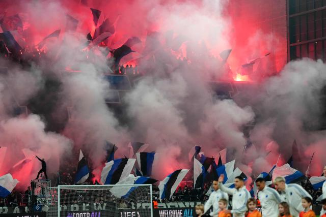 FC Copenhagen's fans light flares before the UEFA Champions League, league Phase - day 7 football match between FC Copenhaben and SSC Napoli in Copenhagen, Denmark, on January 20, 2026. (Photo by Liselotte Sabroe / Ritzau Scanpix / AFP) / Denmark OUT