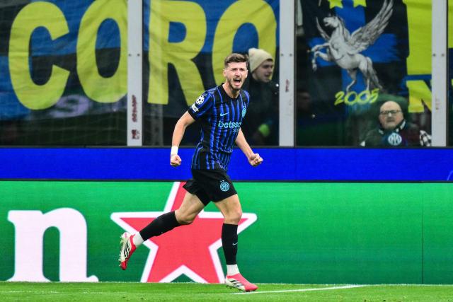 Inter Milan's Croatian midfielder #8 Petar Sucic celebrates after scoring his team first goal during the UEFA Champions League, league phase day 7, football match between Inter Milan and Arsenal at San Siro stadium in Milan, northern Italy, on January 20, 2026. (Photo by Stefano RELLANDINI / AFP)