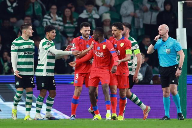 Paris Saint-Germain's French forward #10 Ousmane Dembele (4L) argues with Sporting Lisbon's Portuguese midfielder #52 Joao Simoes (2L) during the UEFA Champions League league phase day 7 football match between Sporting CP and Paris Saint Germain at Jose Alvalade stadium in Lisbon on January 20, 2026. (Photo by PATRICIA DE MELO MOREIRA / AFP)