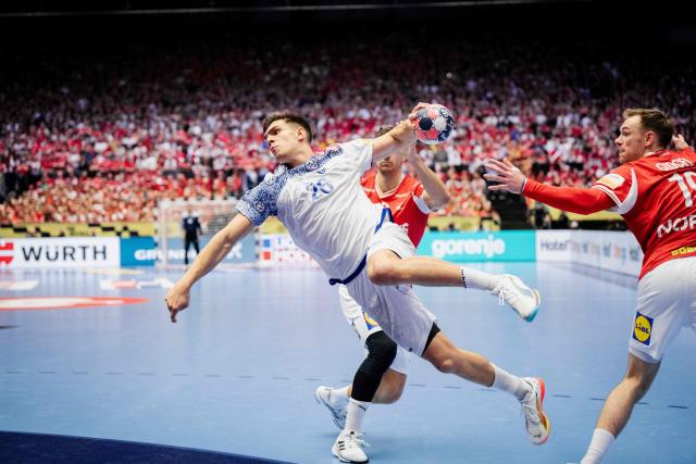 Portugal's right back #26 Francisco Costa shoots the ball during the EHF Euro 2026 Group B preliminary round handball match between Denmark and Portugal in Herning, Denmark, on January 20, 2026. (Photo by Sebastian Elias Uth / Ritzau Scanpix / AFP) / Denmark OUT
