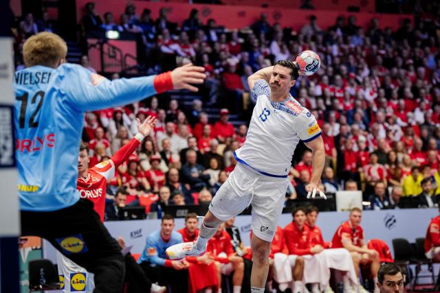 Portugal's left back #13 Salvador Salvador plays the ball during the EHF Euro 2026 Group B preliminary round handball match between Denmark and Portugal in Herning, Denmark, on January 20, 2026. (Photo by Sebastian Elias Uth / Ritzau Scanpix / AFP) / Denmark OUT