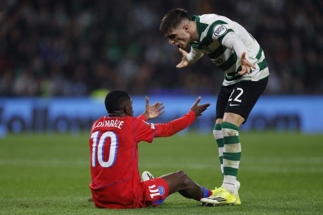Paris Saint-Germain's French forward #10 Ousmane Dembele argues with Sporting Lisbon's Spanish defender #22 Ivan Fresneda during the UEFA Champions League league phase day 7 football match between Sporting CP and Paris Saint Germain at Jose Alvalade stadium in Lisbon on January 20, 2026. (Photo by FILIPE AMORIM / AFP)