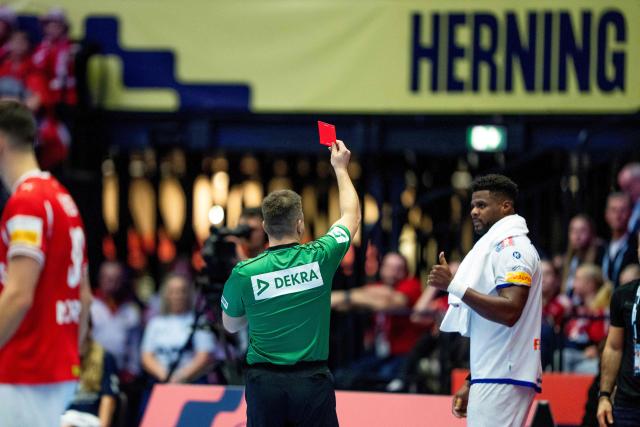 Portugal's pivot #08 Victor Iturriza receives the red card during the EHF Euro 2026 Group B preliminary round handball match between Denmark and Portugal in Herning, Denmark, on January 20, 2026. (Photo by Bo Amstrup / Ritzau Scanpix / AFP) / Denmark OUT