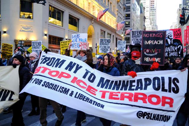 People take part in the nationwide "Stop ICE Terror" rally in New York on January 20, 2026, protesting US President Donald Trump’s immigration policies. (Photo by CHARLY TRIBALLEAU / AFP)