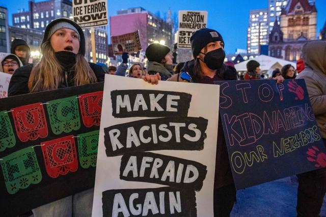 People take part in the nationwide "Stop ICE Terror" rally at Copley Square in Boston, Massachusetts, on January 20, 2026 in protest against US President Donald Trump's policies. (Photo by Joseph Prezioso / AFP)