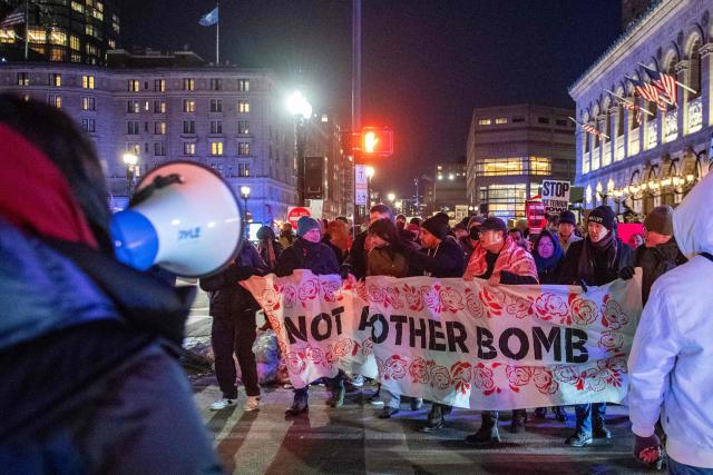 People take part in the nationwide "Stop ICE Terror" rally at Copley Square in Boston, Massachusetts, on January 20, 2026 in protest against US President Donald Trump's policies. (Photo by Joseph Prezioso / AFP)