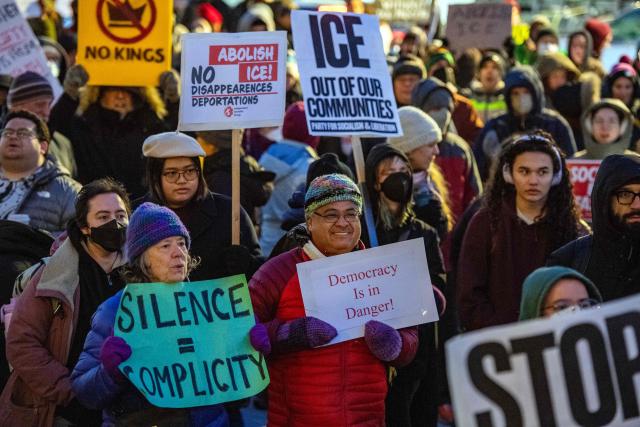 People take part in the nationwide "Stop ICE Terror" rally at Copley Square in Boston, Massachusetts, on January 20, 2026 in protest against US President Donald Trump's policies. (Photo by Joseph Prezioso / AFP)