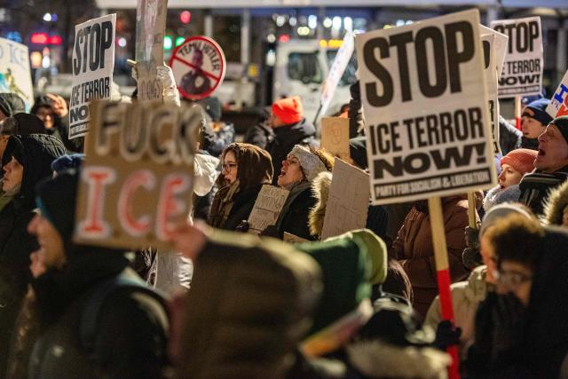 People take part in the nationwide "Stop ICE Terror" rally at Copley Square in Boston, Massachusetts, on January 20, 2026 in protest against US President Donald Trump's policies. (Photo by Joseph Prezioso / AFP)