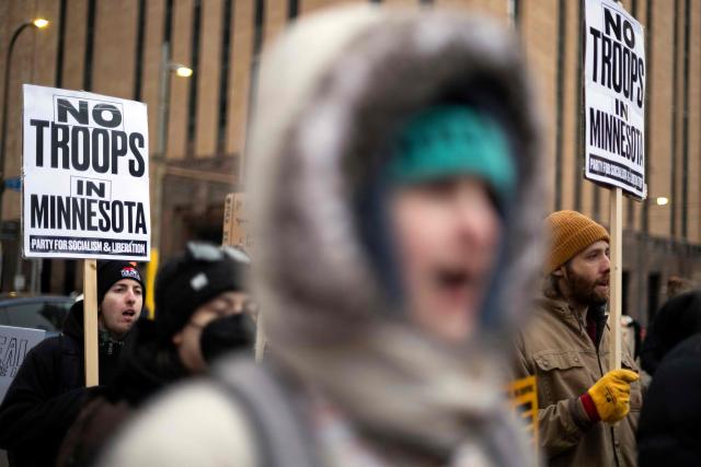 People take part in the nationwide "Stop ICE Terror" rally in Minneapolis, Minnesota, on January 20, 2026 in protest against US President Donald Trump's policies. (Photo by ROBERTO SCHMIDT / AFP)