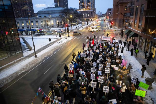 People take part in the nationwide "Stop ICE Terror" rally in downtown Minneapolis, Minnesota, on January 20, 2026 in protest against US President Donald Trump's policies. (Photo by ROBERTO SCHMIDT / AFP)