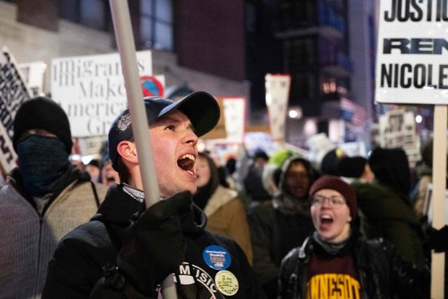 Demonstrators shout slogans as they take part in the nationwide "Stop ICE Terror" rally in downtown Minneapolis, Minnesota, on January 20, 2026 in protest against US President Donald Trump's policies. (Photo by ROBERTO SCHMIDT / AFP)