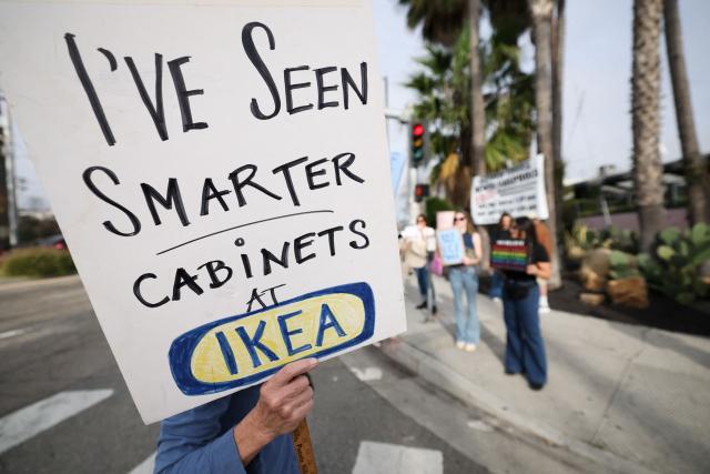 People take part in the Free America Walkout to protest against Immigration and Customs Enforcement (ICE) and US President Donald Trump's policies in the Venice Beach neighborhood of Los Angeles, California on January 20, 2026. (Photo by Patrick T. Fallon / AFP)