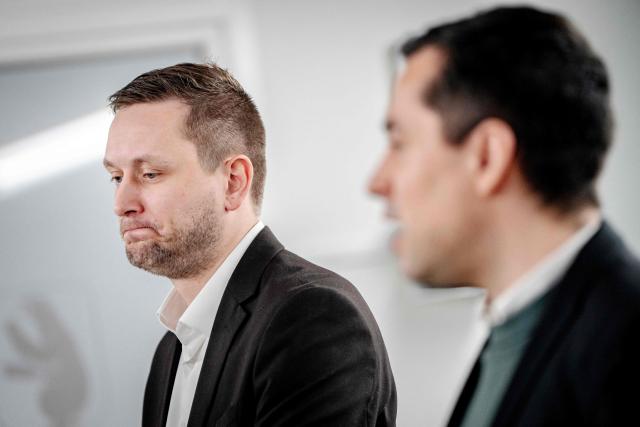 Greenland's Prime Minister Jens-Frederik Nielsen (L) and Minister for Finance and Taxes Mute Bourup Egede hold a press conference in Nuuk, Greenland, on January 20, 2026. Greenland is at the centre of the geopolitical spotlight after US President Donald Trump's bid to seize the island. Trump has said that the United States needs Greenland, which would dramatically increase the US land mass, because of a threat of Russia or China seizing the island as climate change opens up Arctic water routes. (Photo by Mads Claus Rasmussen / Ritzau Scanpix / AFP) / Denmark OUT