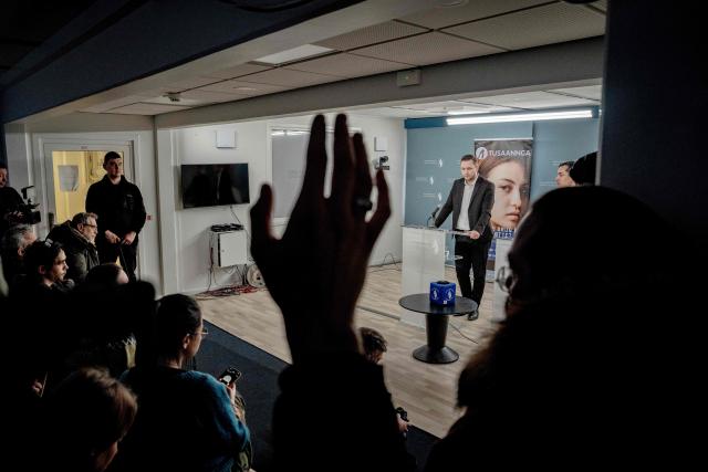 Greenland's Prime Minister Jens-Frederik Nielsen (L) and Minister for Finance and Taxes Mute Bourup Egede hold a press conference in Nuuk, Greenland, on January 20, 2026. Greenland is at the centre of the geopolitical spotlight after US President Donald Trump's bid to seize the island. Trump has said that the United States needs Greenland, which would dramatically increase the US land mass, because of a threat of Russia or China seizing the island as climate change opens up Arctic water routes. (Photo by Mads Claus Rasmussen / Ritzau Scanpix / AFP) / Denmark OUT