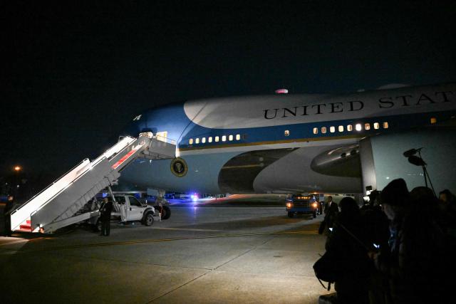 Air Force One is seen on the tarmac at Joint Base Andrews in Maryland on January 20, 2026 after it was forced to return to the air base due to a "minor electrical issue" shortly after departing for Switzerland, the White House said. Air Force One was returning to Joint Base Andrews out of an abundance of caution, Press Secretary Karoline Leavitt said, where Trump and his entourage will switch to another plane and continue the trip to the World Economic Forum in Davos. (Photo by Mandel NGAN / AFP)