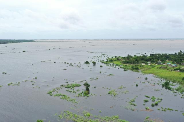 TOPSHOT - This aerial view shows floodwater caused by heavy rains near Maputo on January 20, 2026. At least 114 people have died since the rainy season began in early October 2025, including 51 since Christmas Eve, when downpours intensified and sent torrents of river water crashing through several villages.
The United Nations says the surging waters have spiralled into a rapidly escalating emergency. (Photo by Emidio JOZINE / AFP)