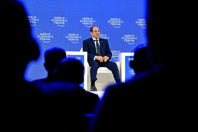Egypt's President Abdel Fattah al-Sisi delivers a speech during the World Economic Forum (WEF) annual meeting in Davos on January 21, 2026. The World Economic Forum takes place in Davos from January 19 to January 23, 2026. (Photo by Fabrice COFFRINI / AFP)